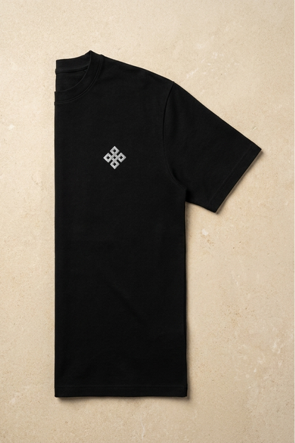 Camiseta de Autor corte relajado: El equilibrio del líder - Bordado de cruz cuadrada